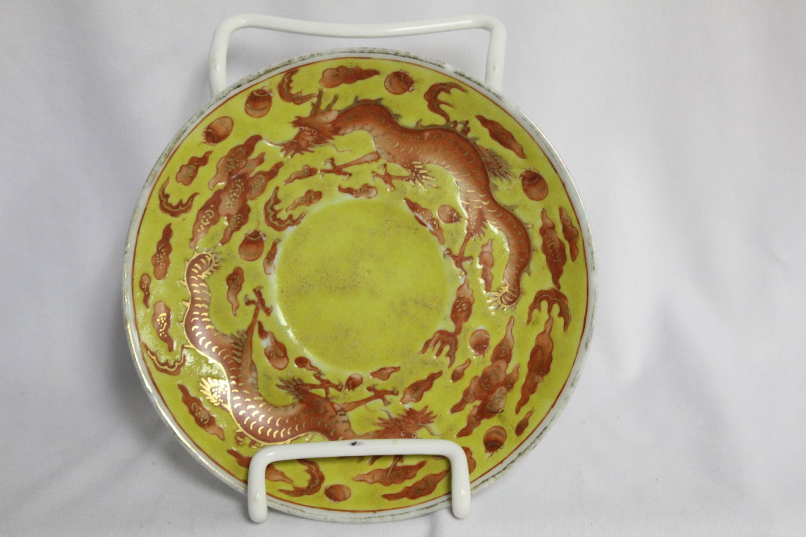 An Antique Chinese Tonzi Dragon Plate: Signed Tonzi, marked and period - most likely imperial - please note: flea bites on the rim as shown - 5 3/4" in diameter - very rare