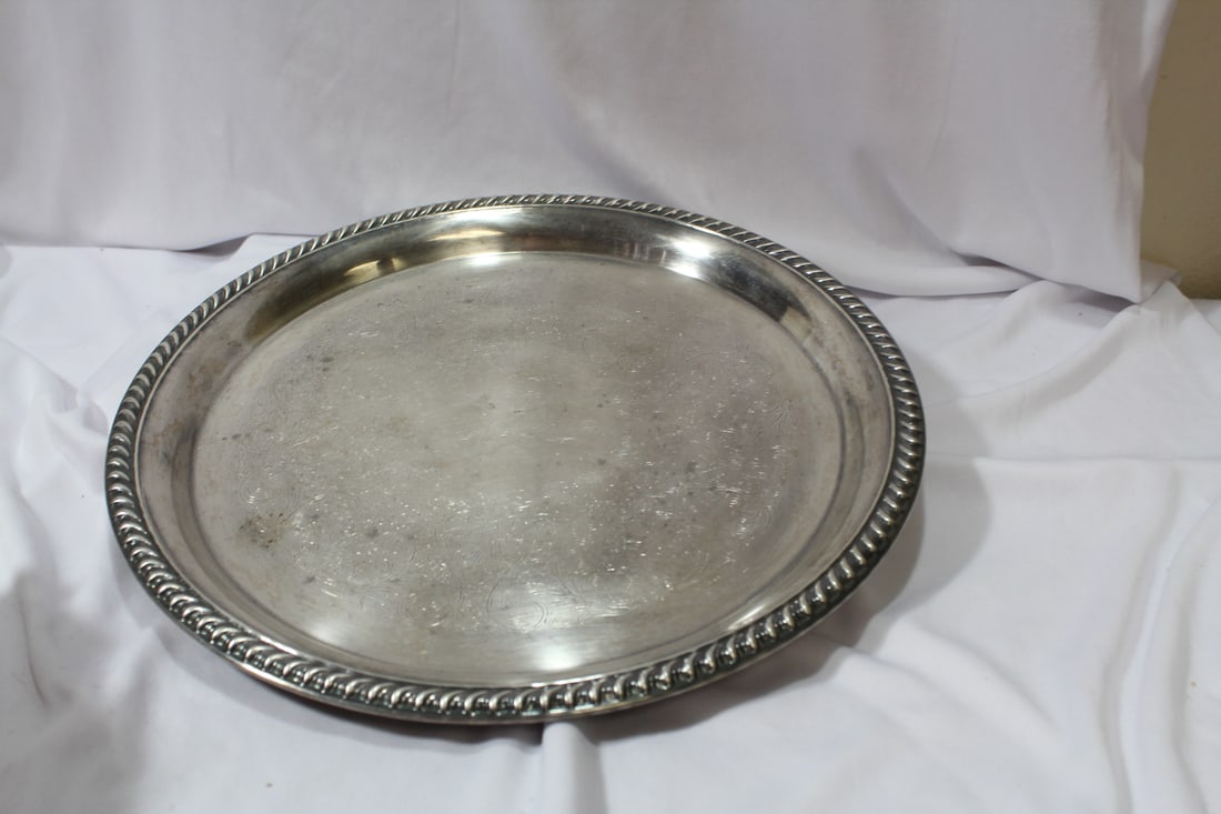 A Silverplated Tray: 12 1/4" in diameter