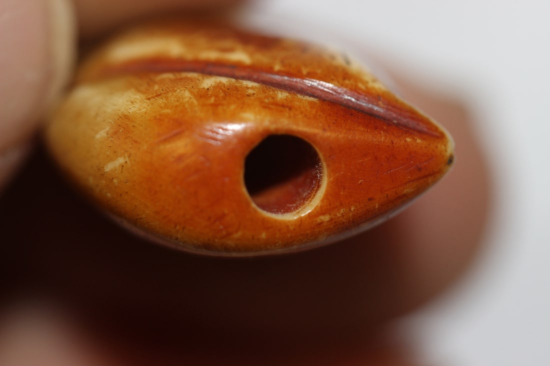 A Small Bone Bead - 4