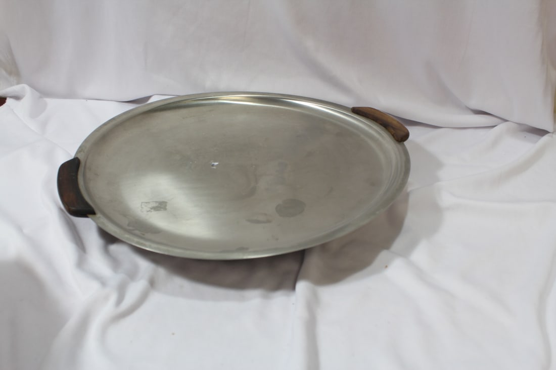 A Silverplated Wooden Handle Tray: mid century modern style - 12" in diameter