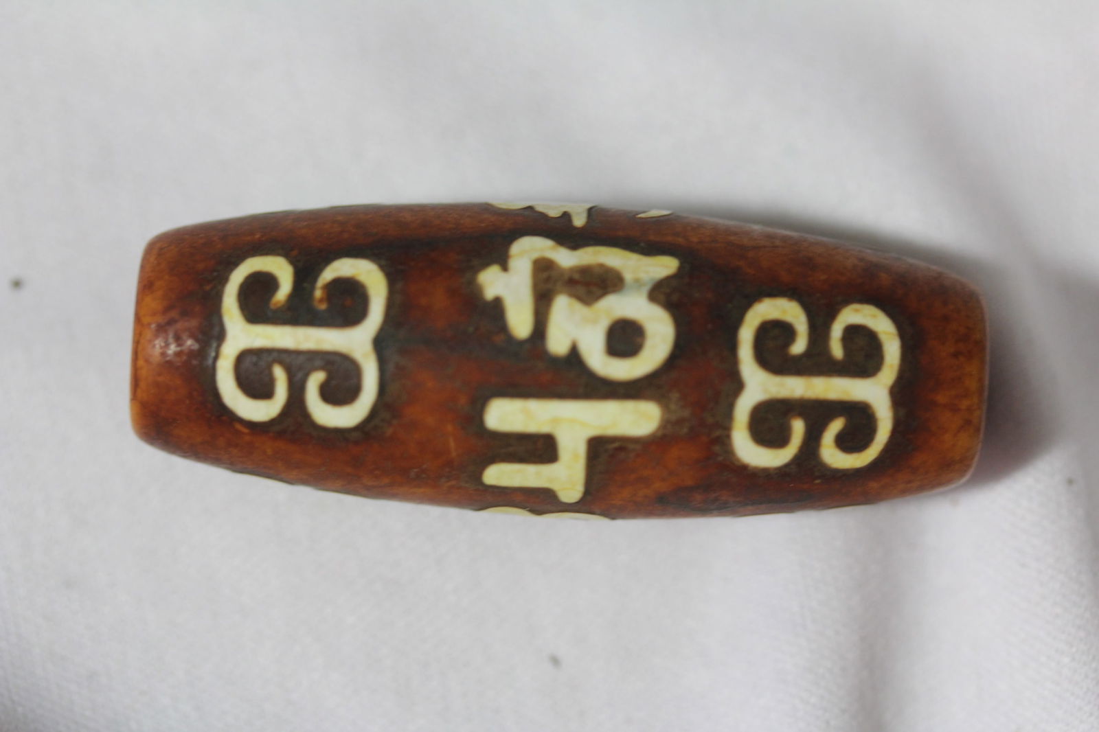 A Large Dzi Bead: 2 1/4" long