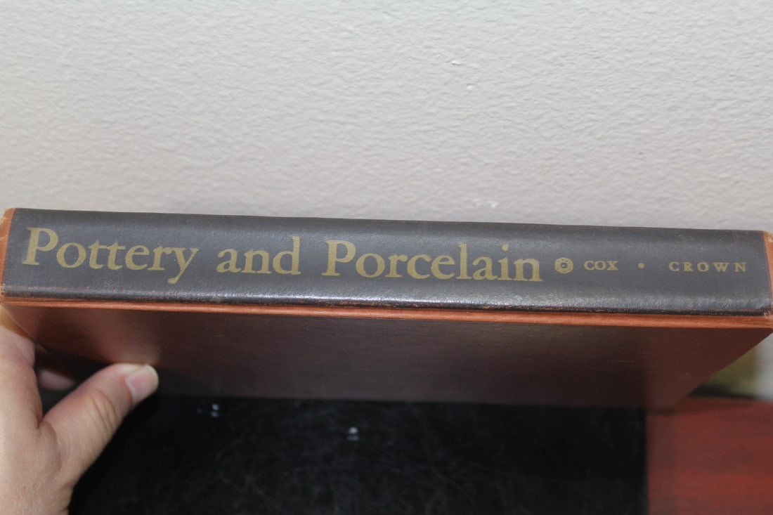 A Hardcover Book on Pottery and Porcelain: as shown