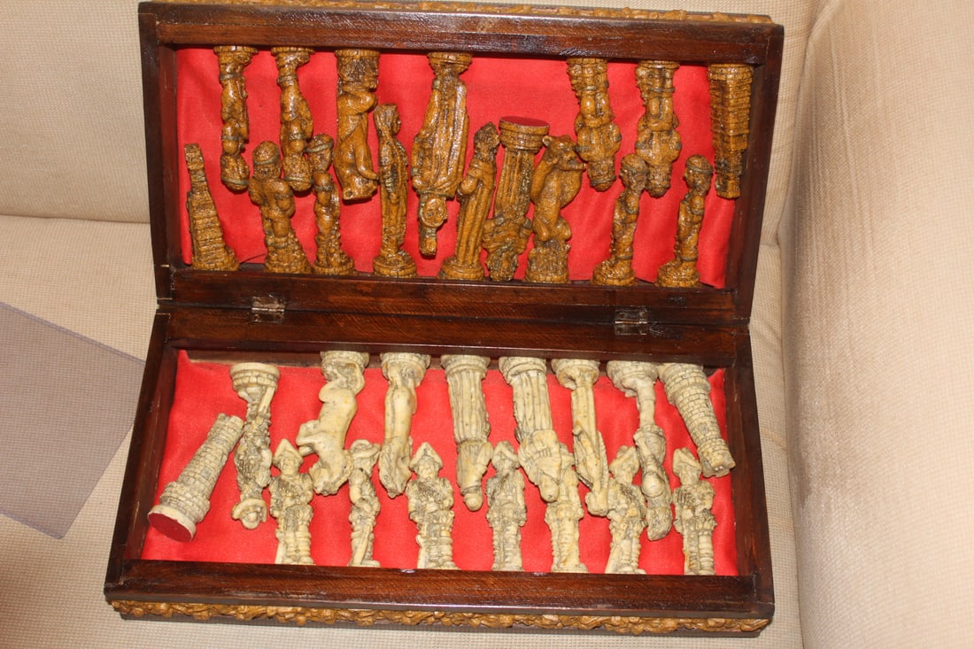Chess Pieces and Ches Board: made up of wood and resing - tallest piece= 6 1/4" - 32 total pieces - heavy - board measures= 18 7/8" square