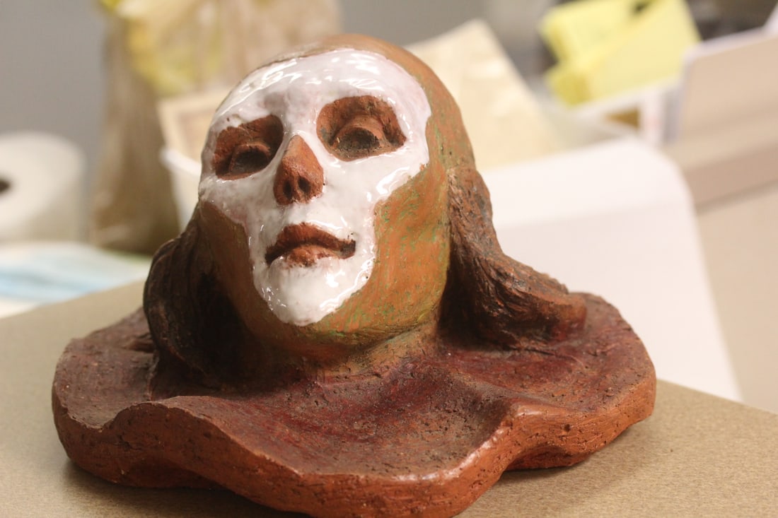 Sculpture by Harold Stacy: terra-cotta - 9 1/2" wide