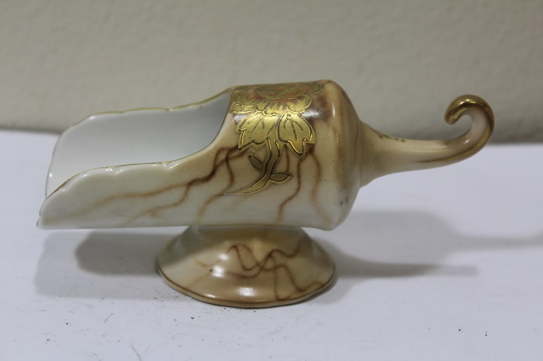 A Japanese Porcelain Holder: handpainted - 5" across