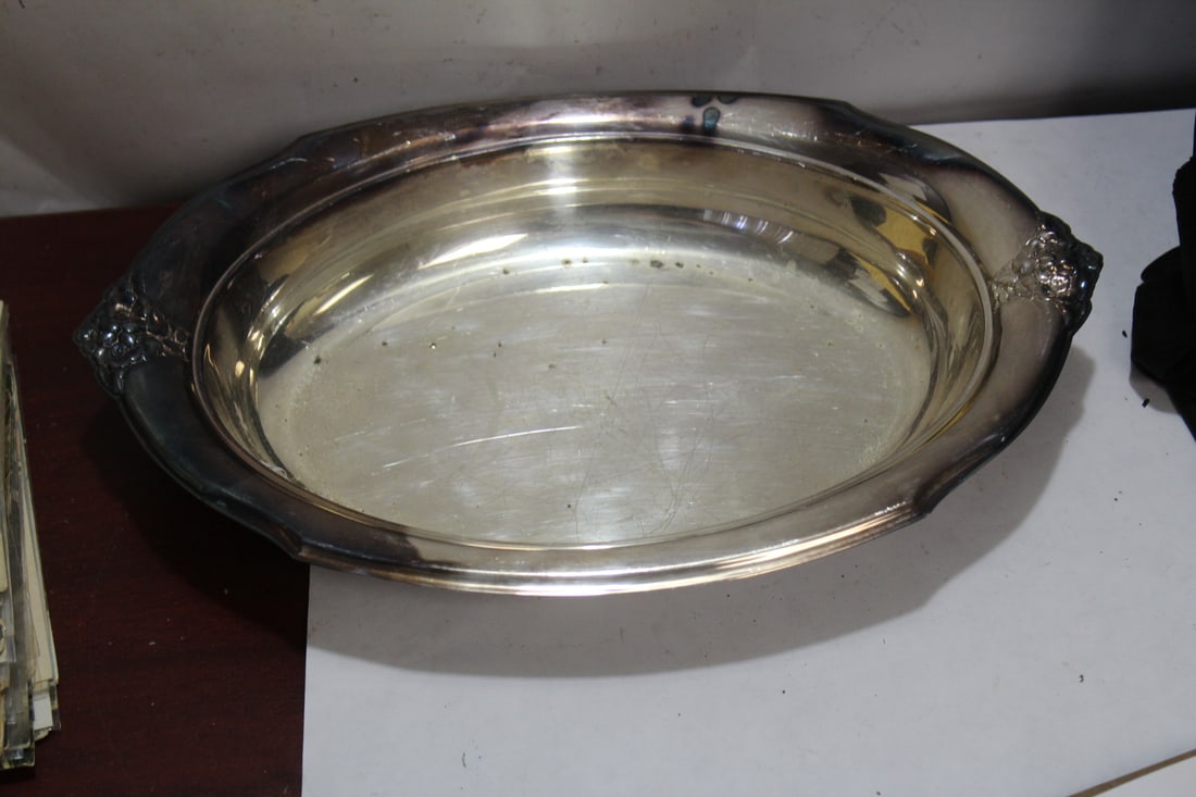 A Silverplated Bowl: 12 inches across