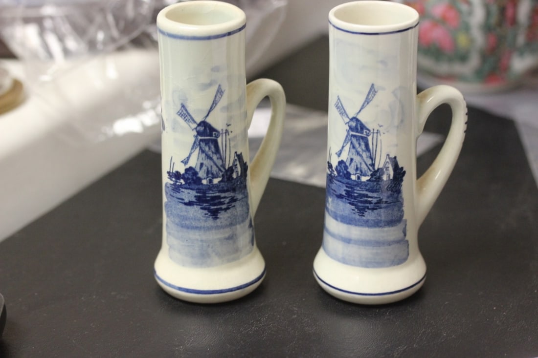 A Pair of Delfts Holland Miniature Pitcher: each measure 4 5/8" tall
