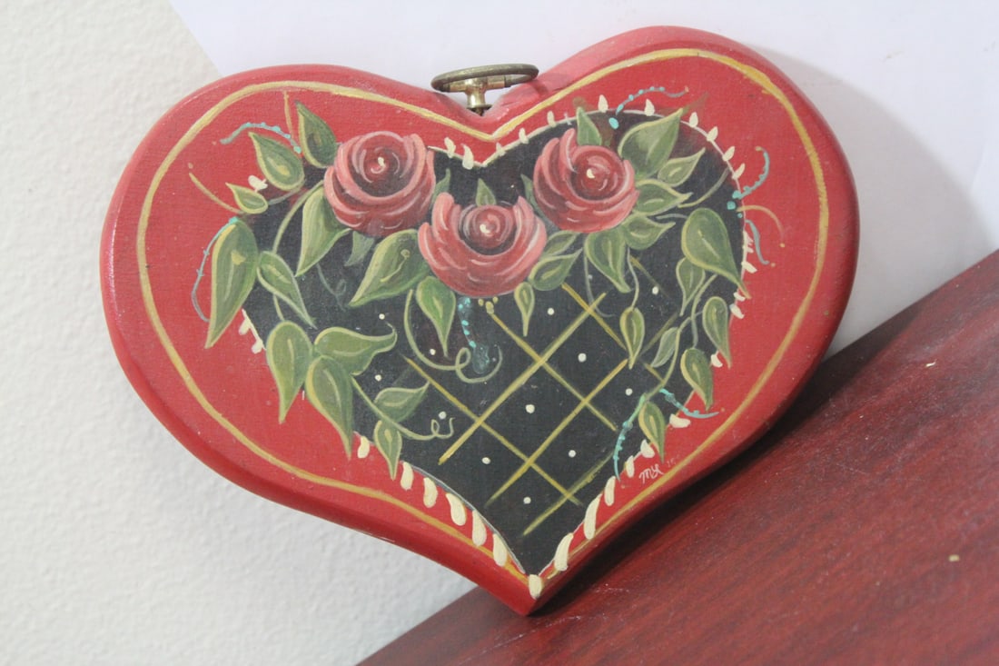 A Heart Shape Wooden Wall Hanger: 8 1/4" across