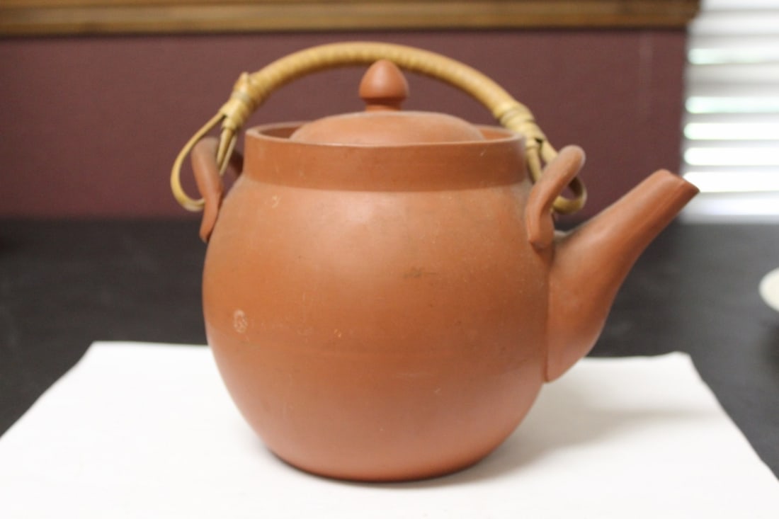 A Yixing Teapot: Made in China - measures6" inches tall when lidded, without the handle