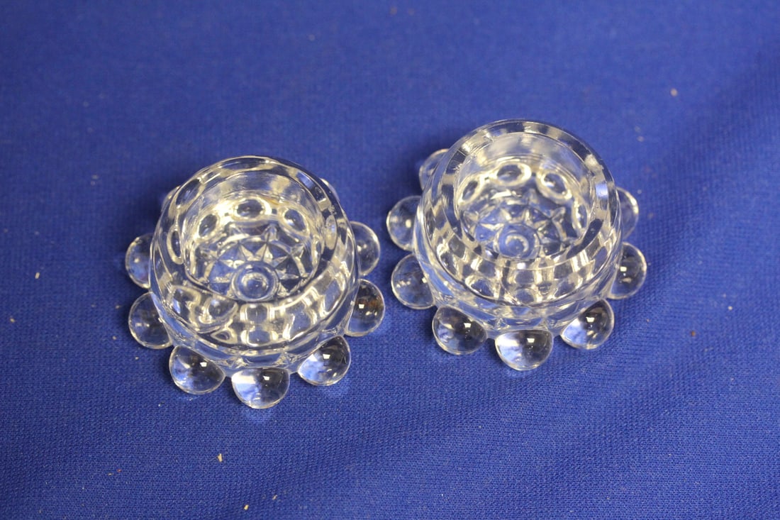 Pair of Glass or Crystal Candle Holders: base diameter= 2 3/8" - inside diameter 1 inch