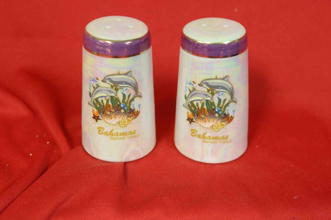 A Pair of Salt and Pepper Shaker: 3" tall