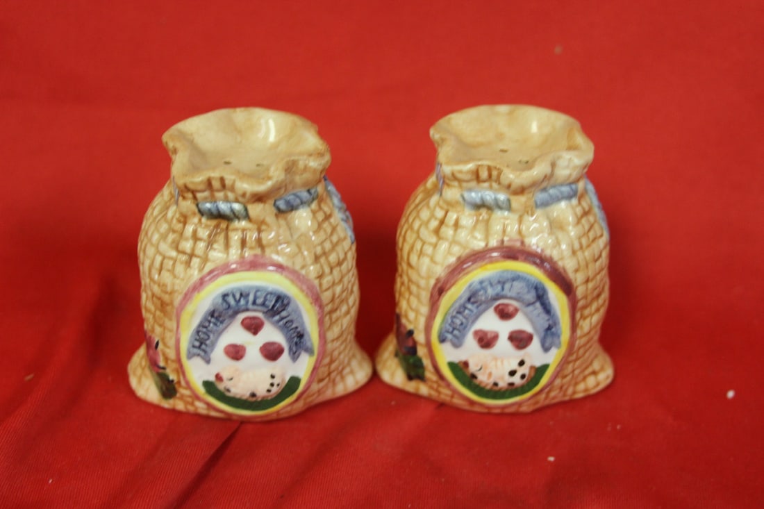 A Pair of Salt and Pepper Shaker: 3" tall