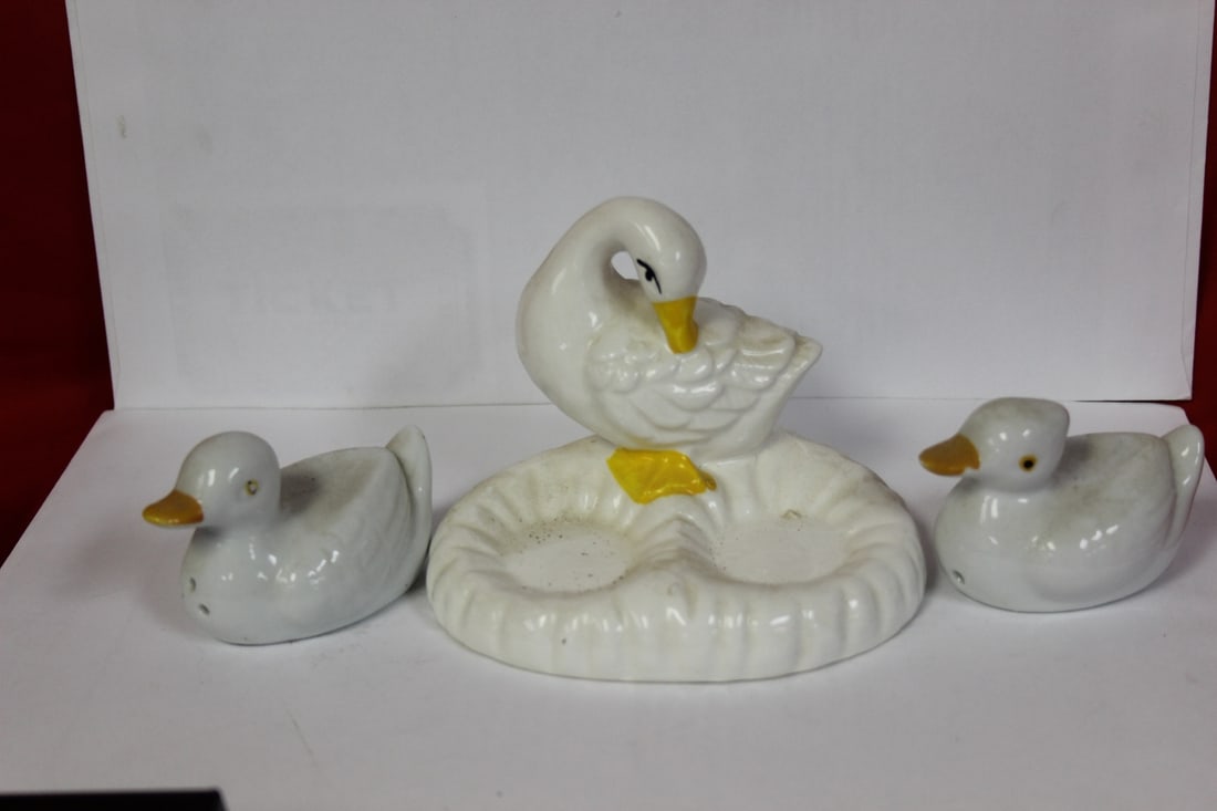 Pair of Salt and Pepper Shakers Plus Holder: as shown