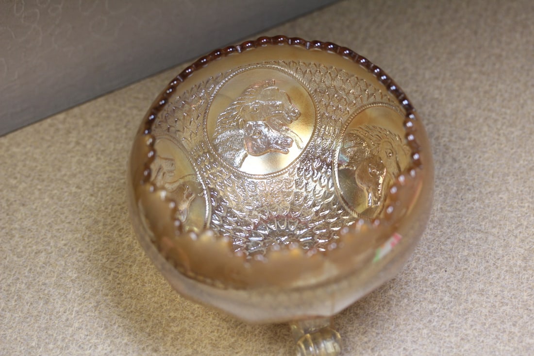 Carnival glass bowl: 3 3/4" tall, Parohs horses, rare pattern