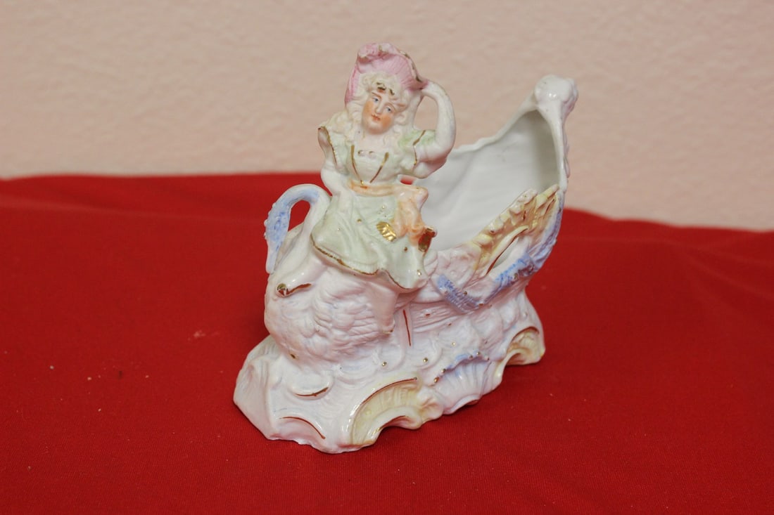 A Ceramic Figurine: 5 1/2" tall