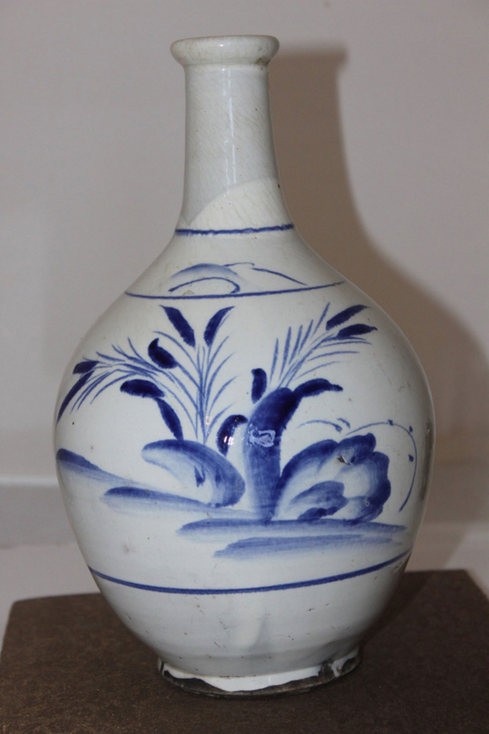 Antique Japanese/Korean Blue and White Wine Bottle: Drilled. 10 3/4" diameter. Circa 19th/20th century.
