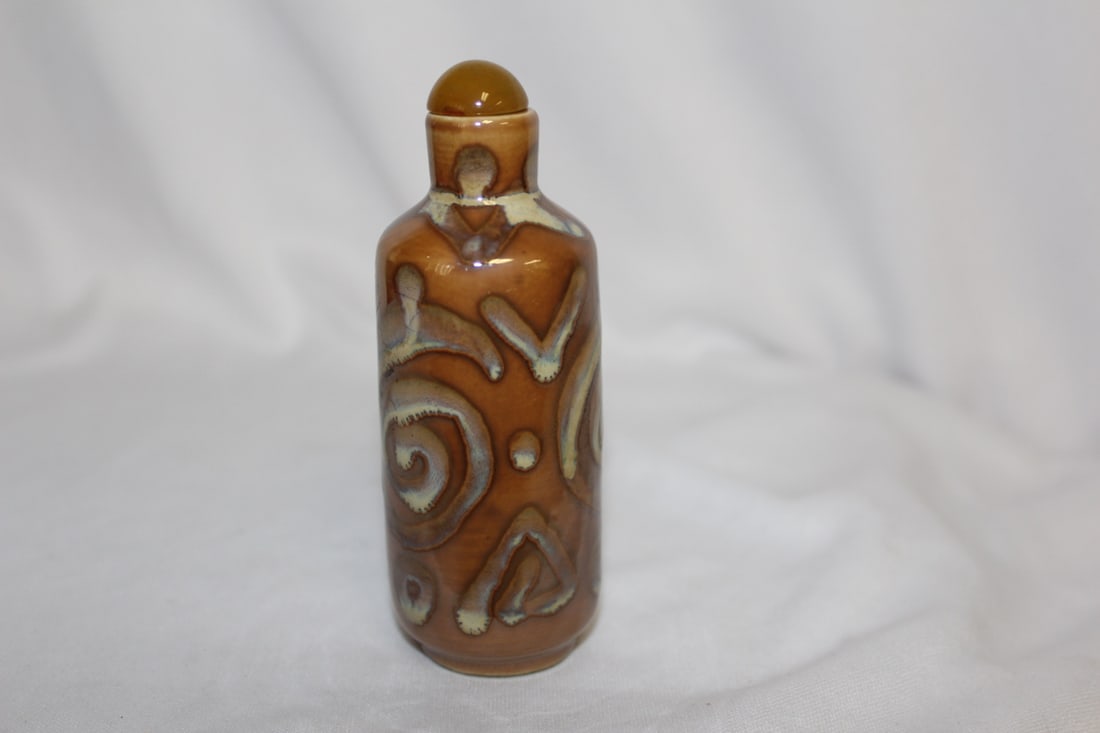 A Ceramic Snuff Bottle: 4" tall