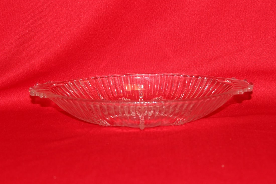 A Glass Jewelry Dish: 4 1/2" in diameter