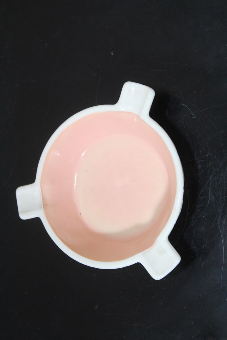 A Milk Glass Ashtray: 4 5/8” Across