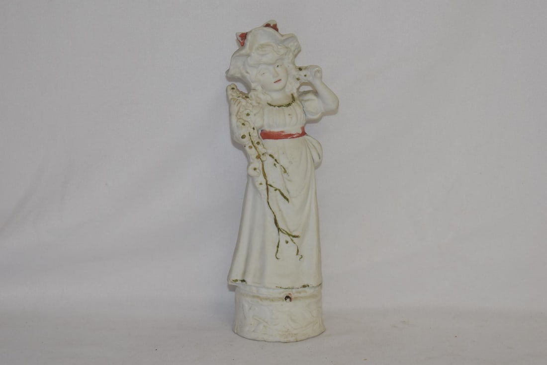 A Bisque Figurine: 7 3/4" tall