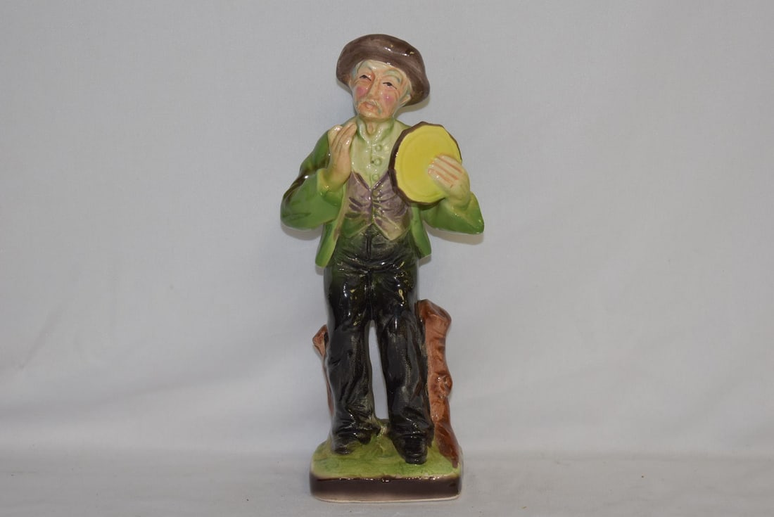 An Old Eramic Figurine: 8 1/4" tall