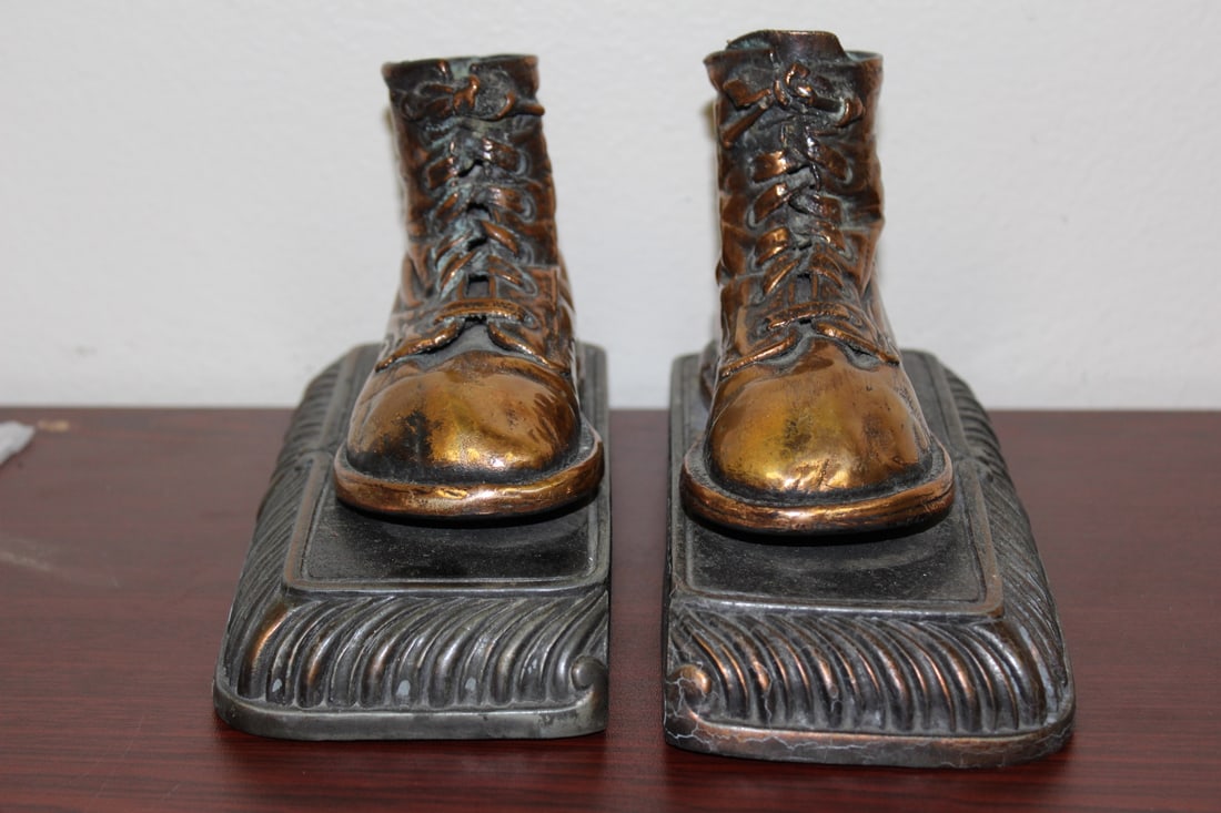 A Pair of Metal Book Ends: shoe form - 7 1/2" long - vintage