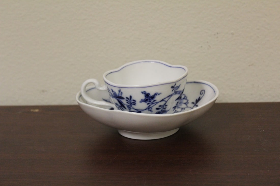 A Meissen Blue Onion Demitasse Cup and Saucer: saucer= 5 1/4" in diameter