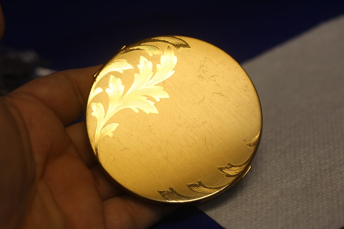 An Elgin Compact: 3 inches in diameter