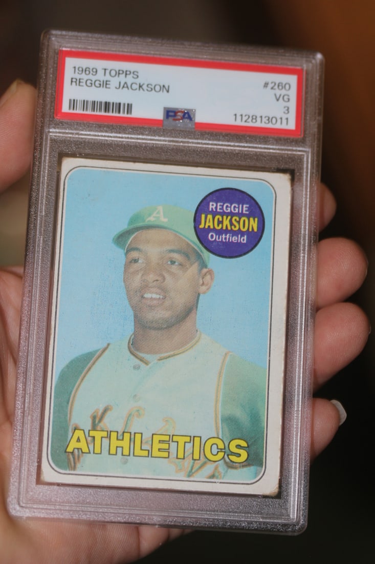 A PSA Graded Reggie Jackson Rookie Card: as shown