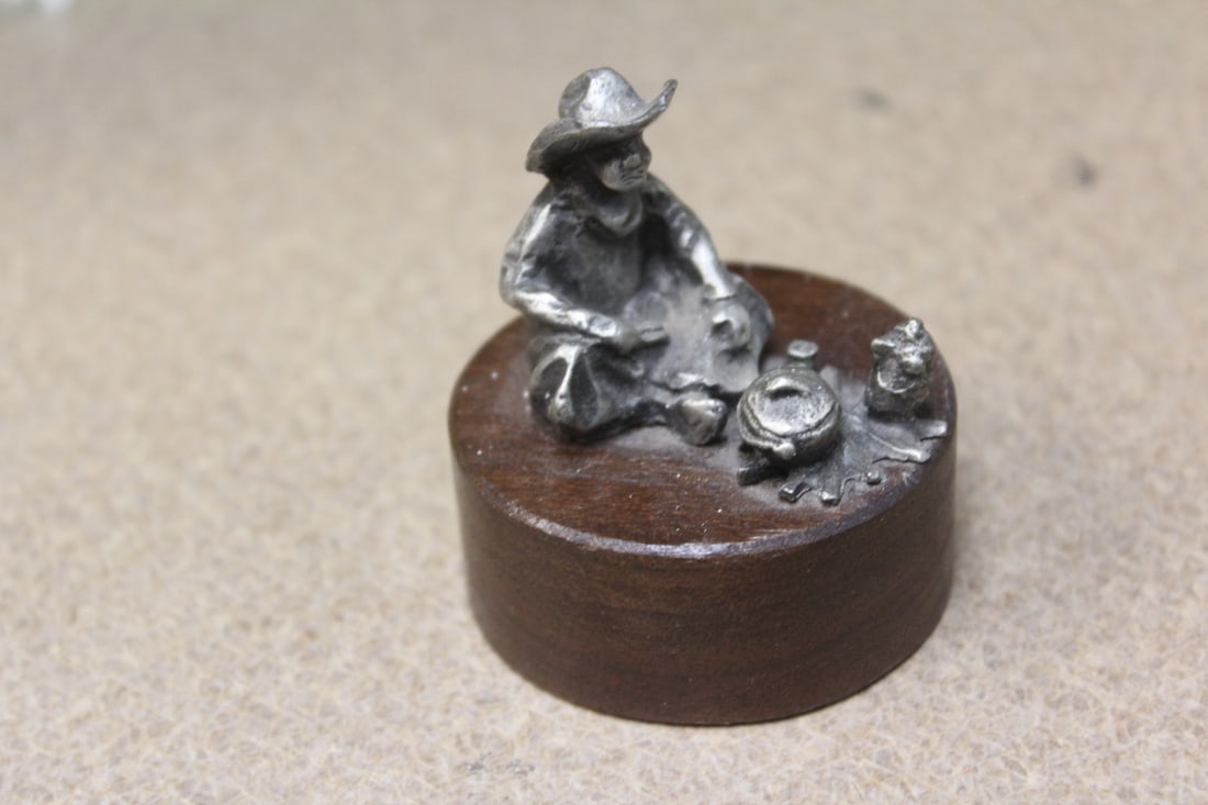 Cowboy Pewter on Wood Stand: 2" across