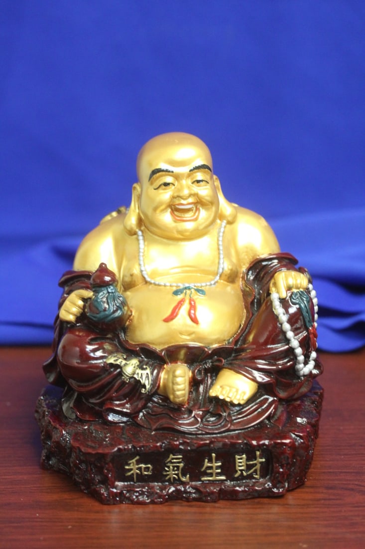 A Golden Resin Buddha: 6" tall