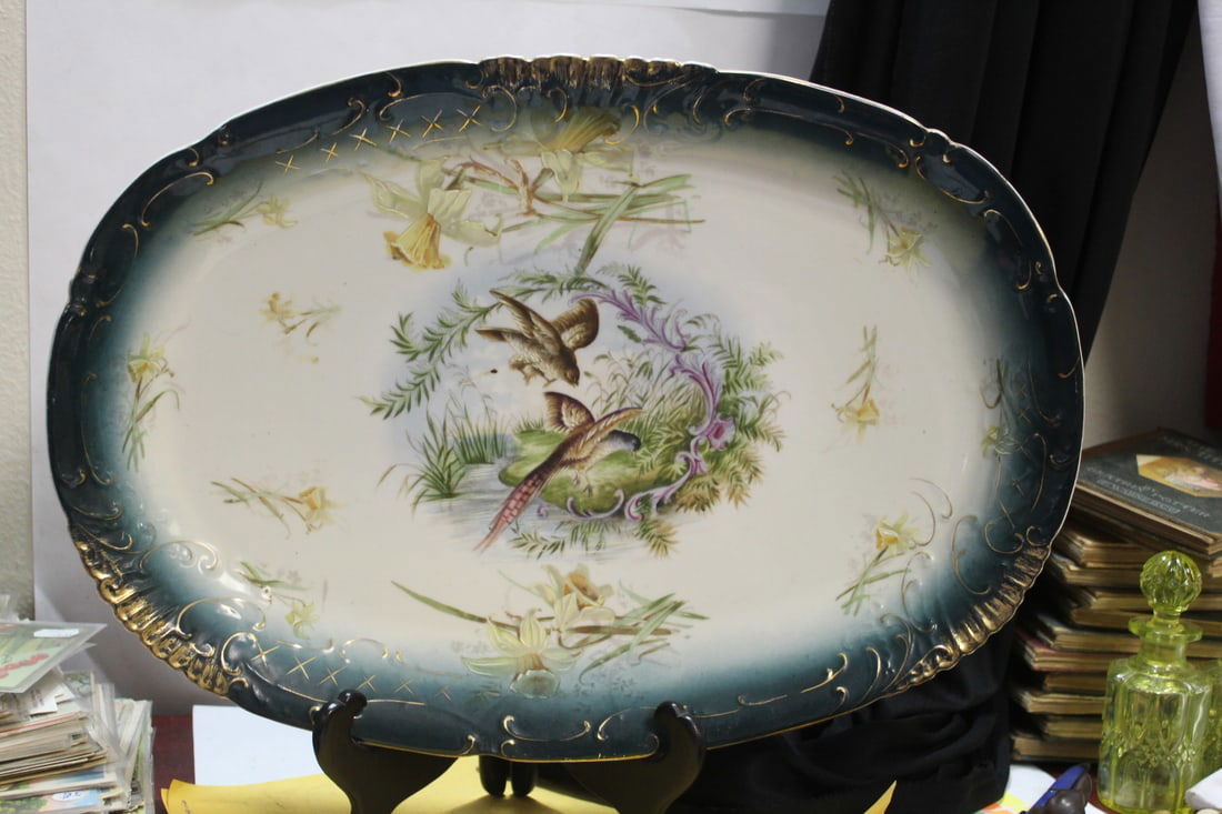 An Austrian Ceramic Bird Platter: 17 1/4" in diameter