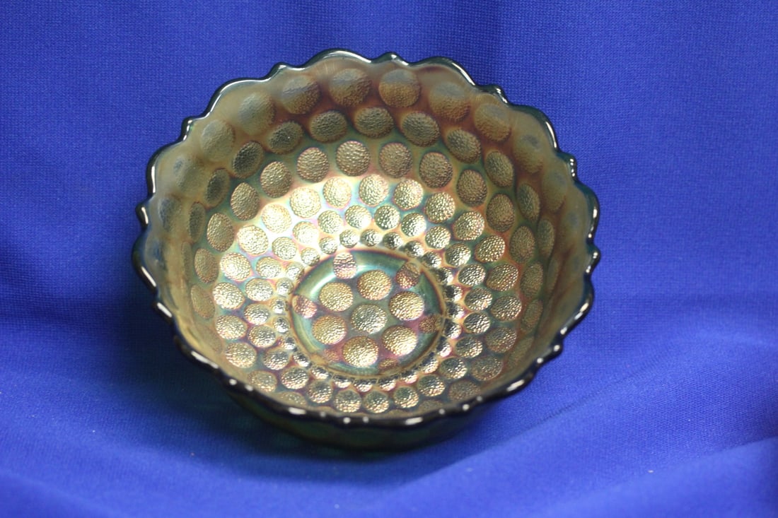 A Carnival Glass Bowl: unusual pattern - 6 inches in diameter