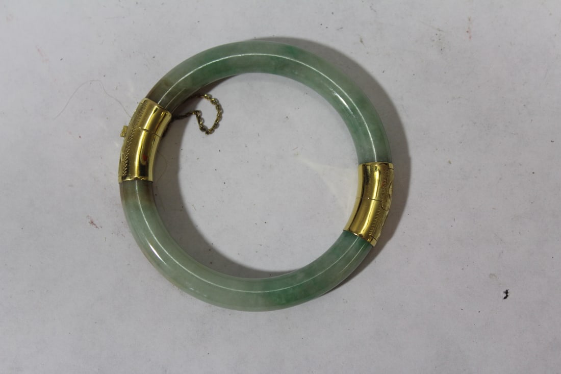 A 14Karat Gold Bangle Bracelet: gold and Apple Green Jade or Jadeite