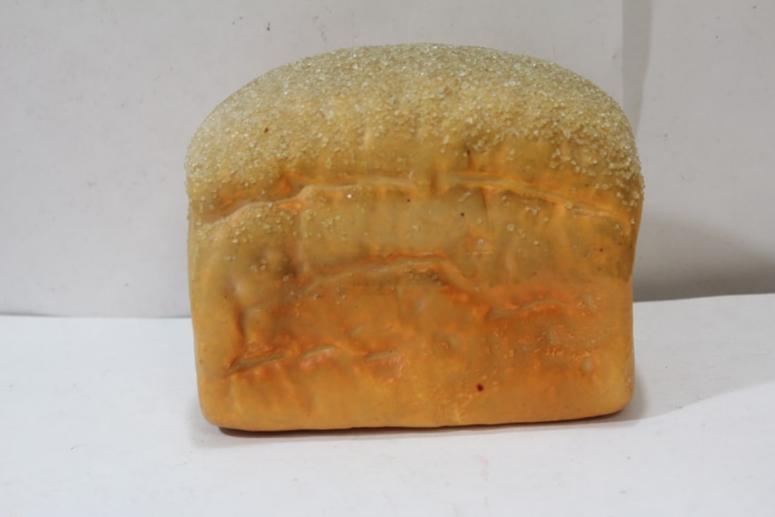 A Vintage Loaf of Bread Plastic Toy: 5 1/4" across