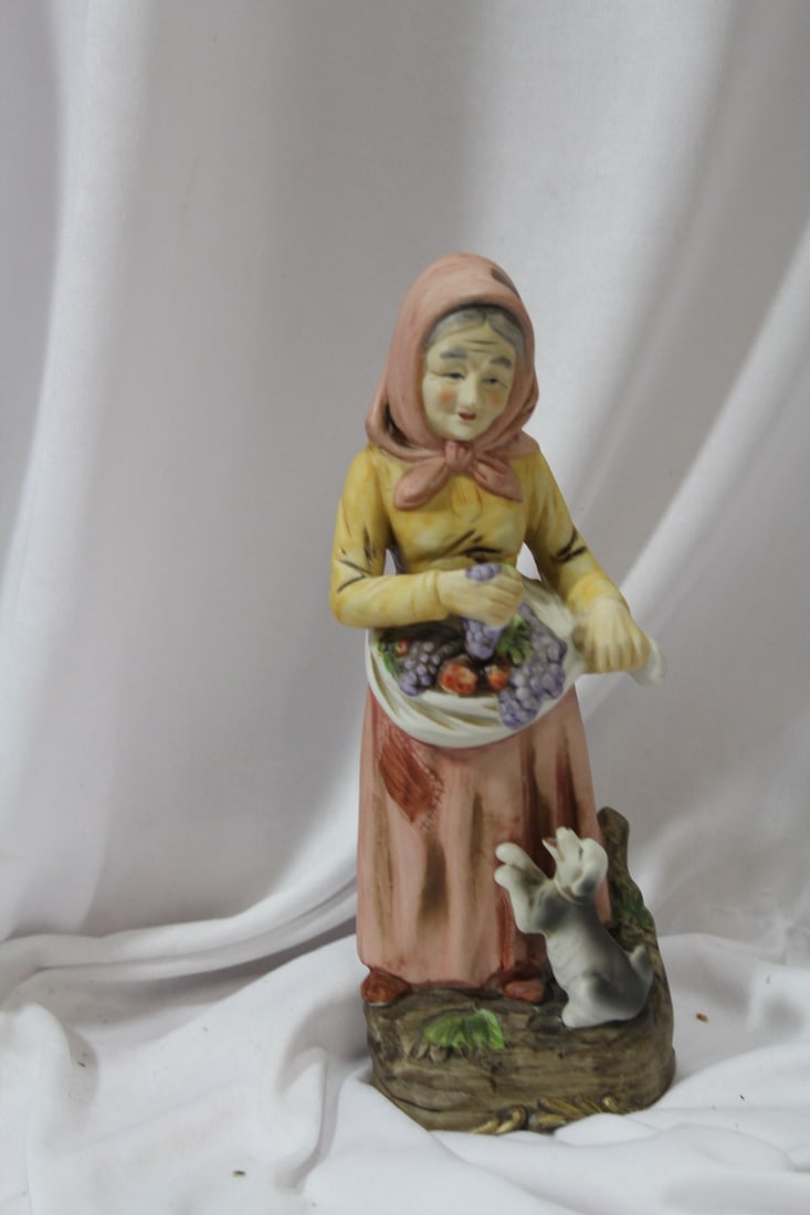 A Homco Figurine: 8 1/8" tall