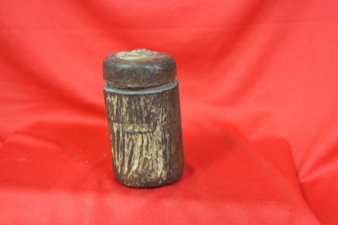 An Old Leather Wrap on Wood Container: possibly for dices and used for gambling - 3 3/4" tall