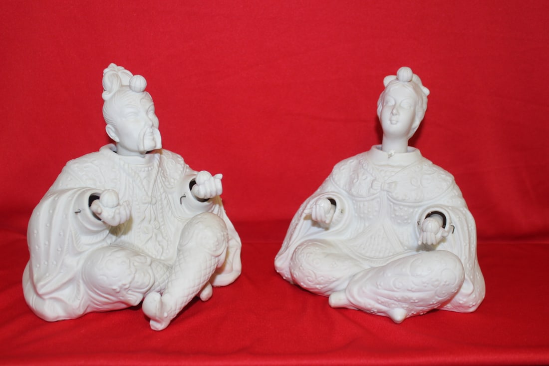 A Pair of Oriental Noddlers - Man and Woman: Bisque construction - 8" tall