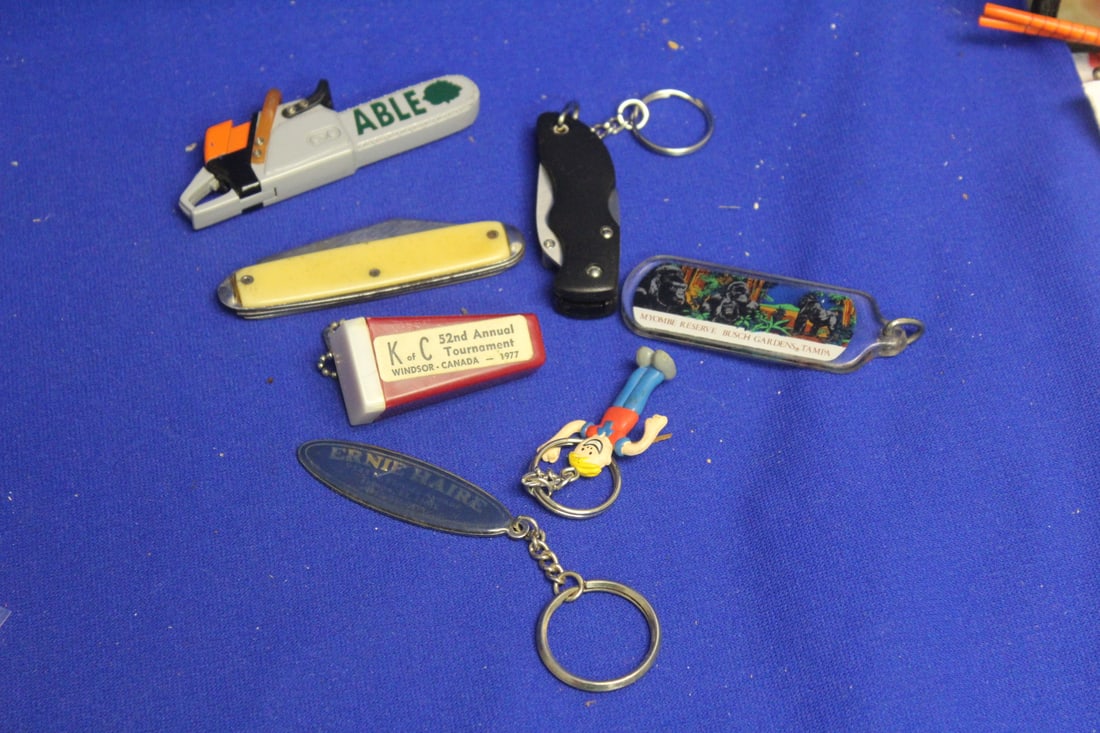 Lot of Miscellanious Items: to include vintage lighter, knives and key chains