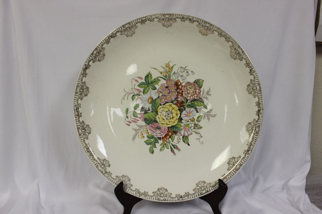 A 22 Karat Gold Plated Charger: 12 1/2" in diameter