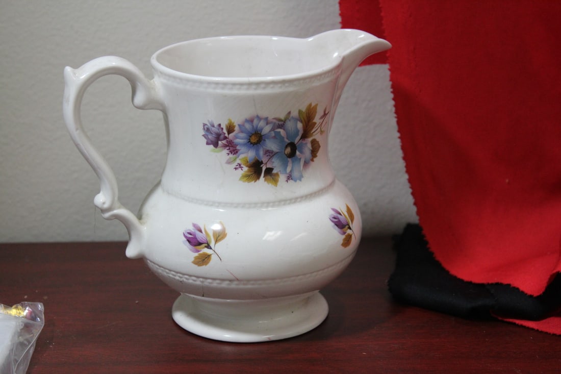 A Ceramic Pitcher - 3