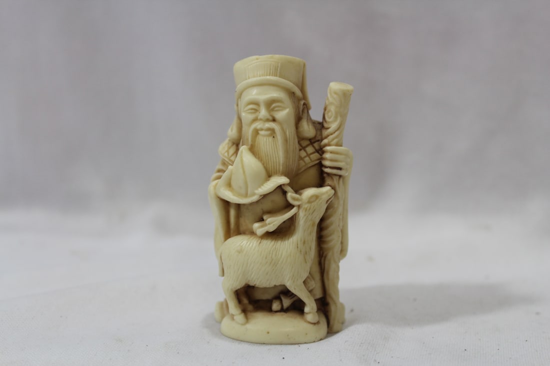 A Japanese Resin Figurine: nicely carved - 3" tall