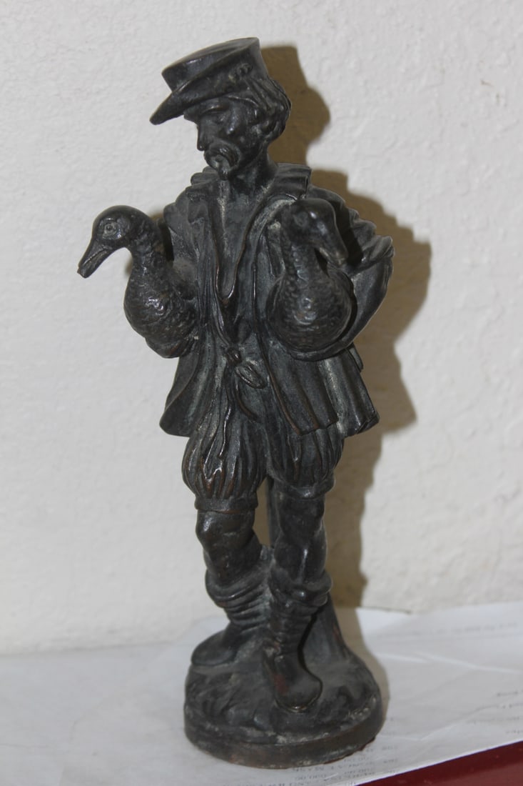 Antique Bronze Figurine: bronze or other metal -heavy - 8 3/4" tall