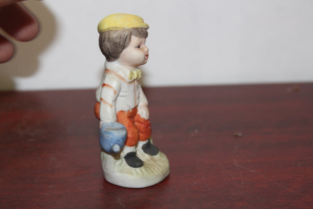 A Ceramic Figurine - 4