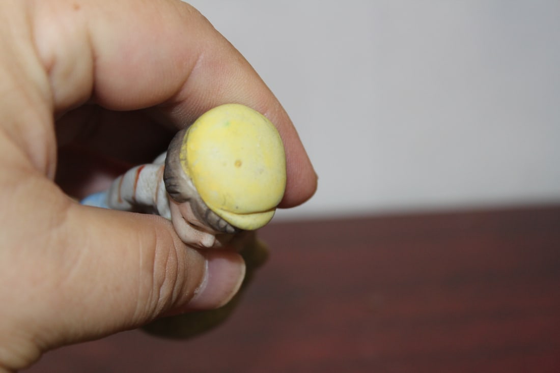 A Ceramic Figurine - 6