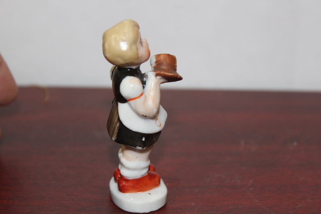 A Ceramic Figurine - 4