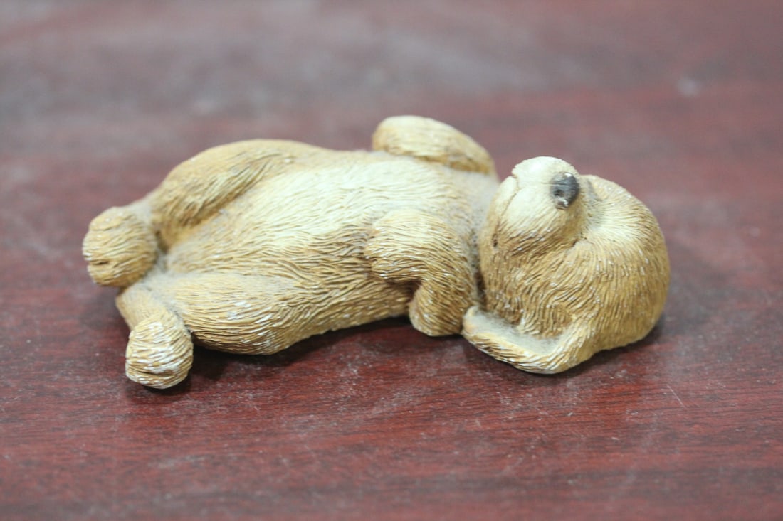 A Composite Material Sandicast Dog: marked Brue - 3 1/2" long