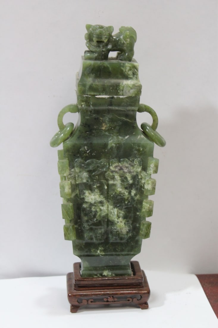 A Spinach Jade Chinese Urn: please note: glue residue and glued to the stand - overall= 10 1/4" tall