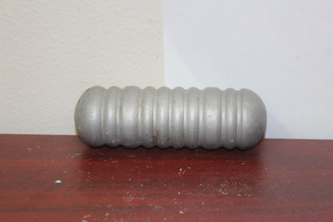 A Vintage Aluminum Floater: 5" across