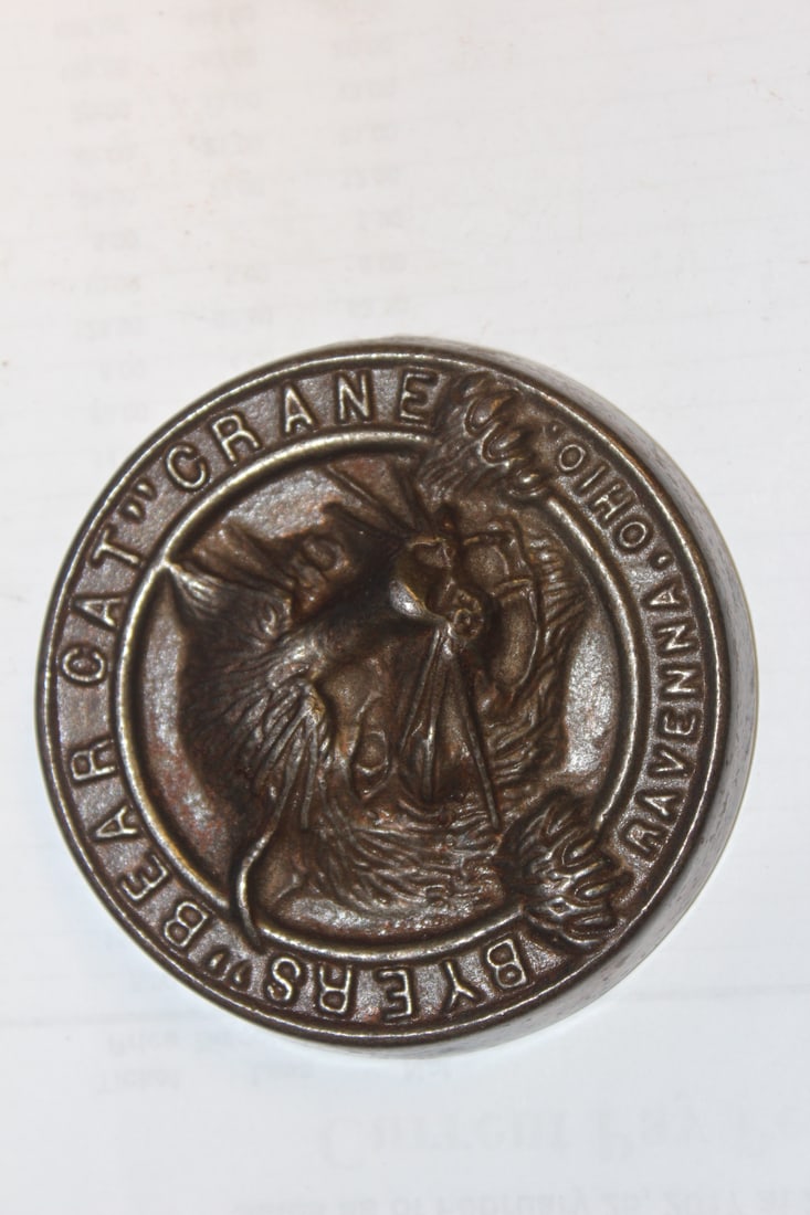 A Vintage Paperweight: early 1900's - Byers Bear cat crane ravenna ohio metal - 3 1/4" in diameter